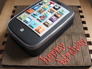 Photo of a birthday cake made to look like an iPad, brought to you by Octa, makers of the Whale Kit and Monkey Kit stands for iPad.