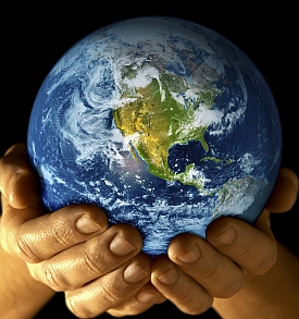 Image of the Earth being held by human hands, brought to you in celebration of Earth Day by Octa, creators of versatile iPad stands.